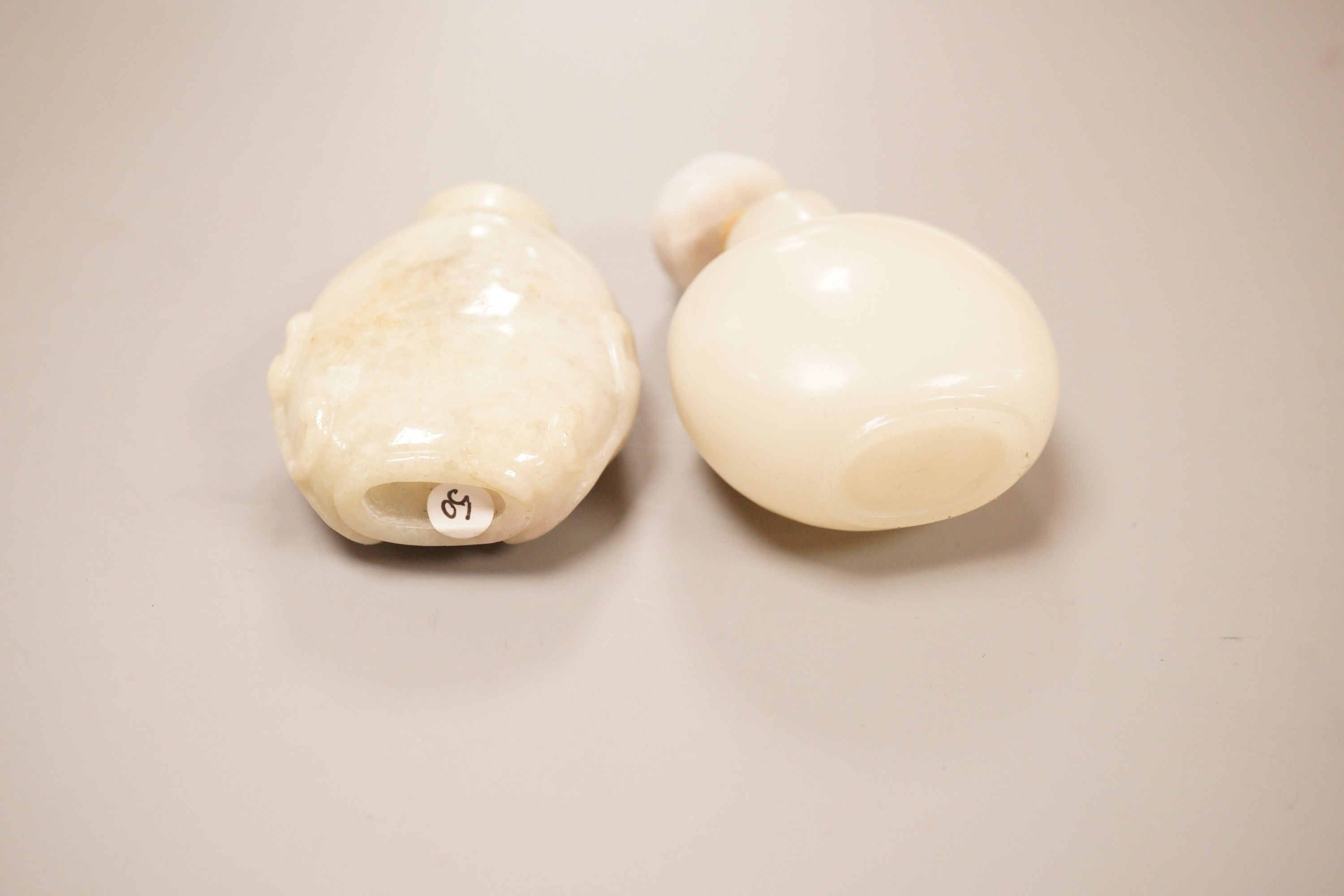 A Chinese jadeite snuff bottle and a glass snuff bottle